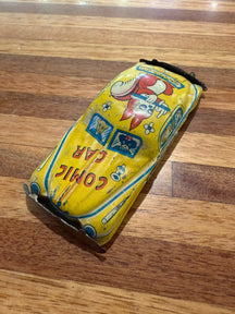 Vintage Japanese Tin Yellow Comic Car 1950’s